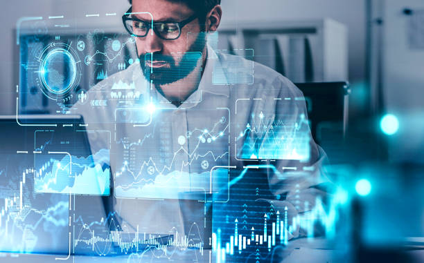 istock Bearded man in glasses in office, HUD infographics 1269696463