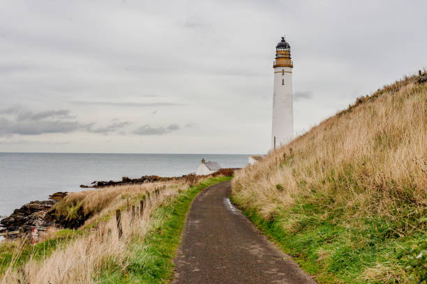 istock Narrow track to Scurdie Ness Lighthouse. 1269698081
