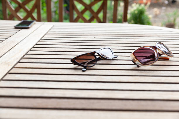 Free Stock Photo of Sunglasses Resting on Wooden Table | Download Free ...