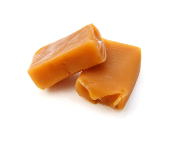 istock Caramel isolated on a white background with a clipping path. 1269706198