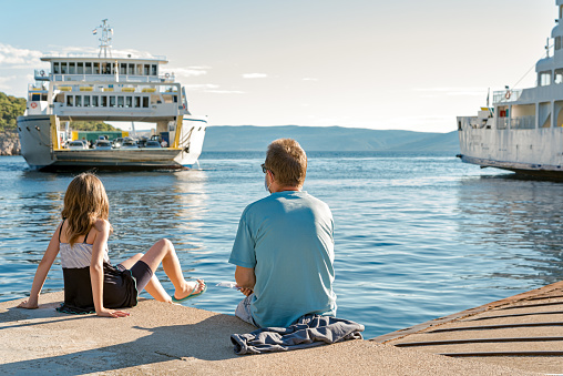 Girl with Father at the Pier  Waiting for Ferry Boat, Croatia