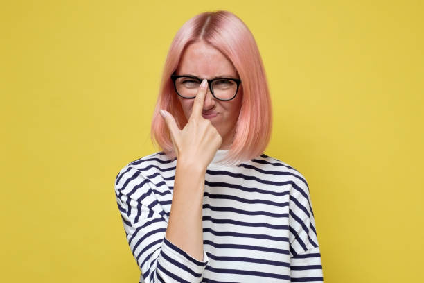 istock Exhausted millennial caucasian girl taking on uncomfortable glasses. 1269708928