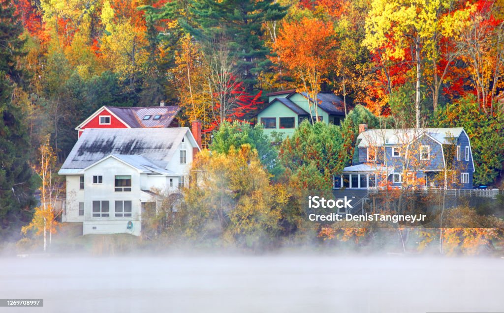 Autumn in Saranac Lake, New York Saranac Lake is a village in the state of New York, United States. The village lies within the boundaries of the Adirondack Park Adirondack Mountains Stock Photo