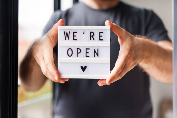 istock End of quarantine. Greeting message We're open 1269709881