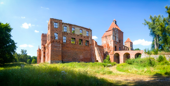 Szymbark, Poland - August 16,2020:Panoramic view of fourteenth-century castle in the village of Szymbark built by the Pomesanian chapter. It was burnt down in 1946 by the Red Army and has been in ruins ever since.