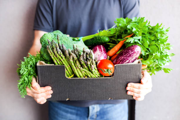istock Fresh organic greens and vegetables delivery 1269710443