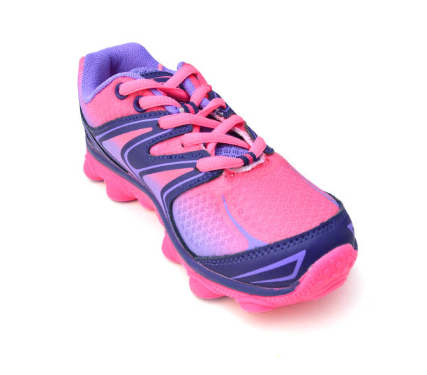 istock Pink sport shoes for running on white 1269716518