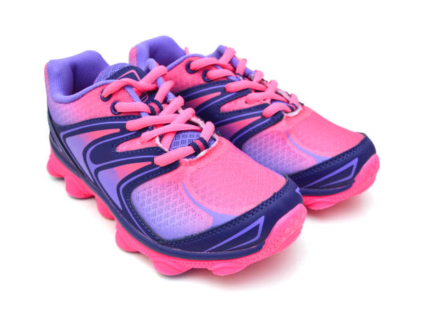 istock New unbranded running shoe, sneaker or trainer isolated on white 1269716545