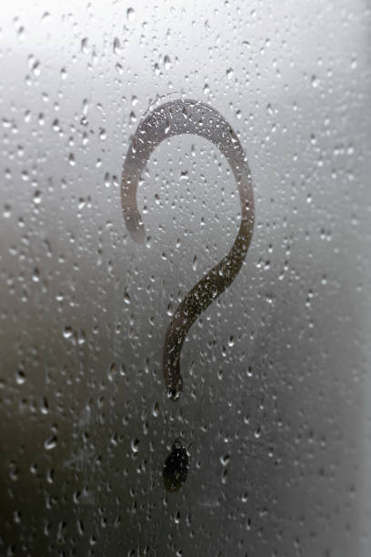 istock Question mark written by a finger on a misted glass. 1269717263