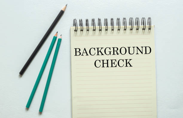 two green one black pencil with text Background Check in the notebook on the white background two green one black pencil with text Background Check in the notebook on the white background escribir stock pictures, royalty-free photos & images