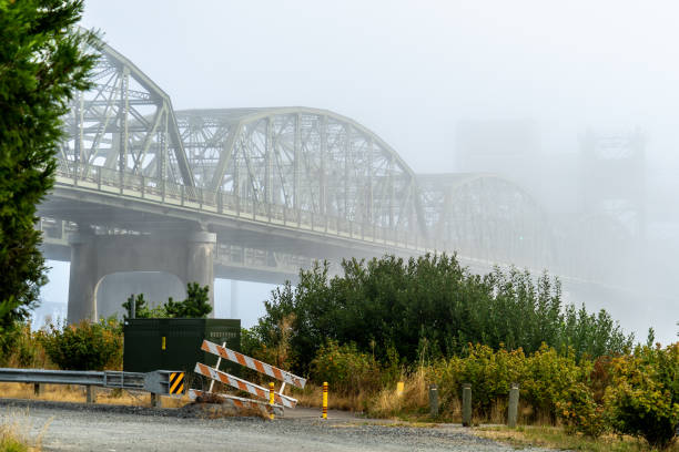 Fog Over SR 529 that crosses the Snohomish River Everett, WA. USA - 08/25/2020: Fog Over SR 529 that crosses the Snohomish River everett washington state stock pictures, royalty-free photos & images
