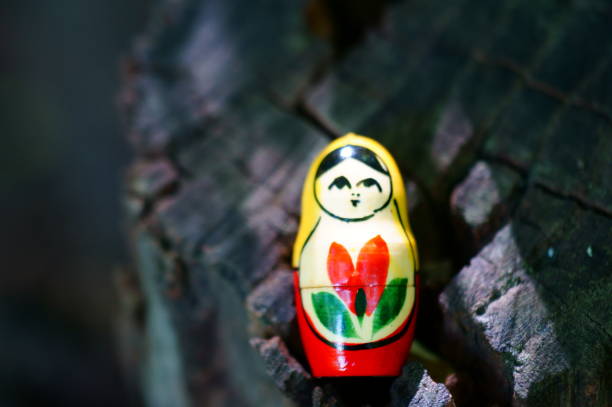 Matryoshka on a wooden background. Background image.