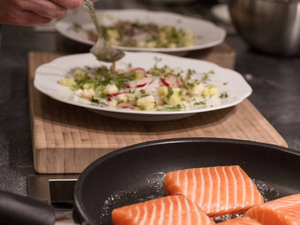 istock Salmon trout on radish salad is prepared 1269724142