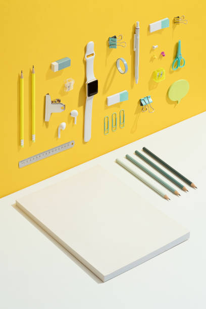 istock Stationary flat lay on yellow and white background 1269725884