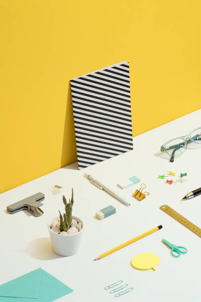 istock Stationary flat lay on yellow and white background 1269725953