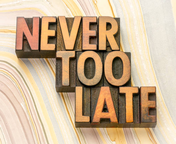 istock never too late word abstract in wood type 1269726901