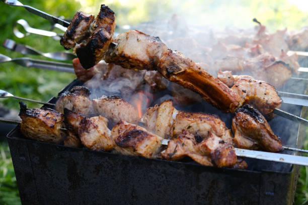 istock Shashlik, roasted meat skewers on charcoal fire 1269727063