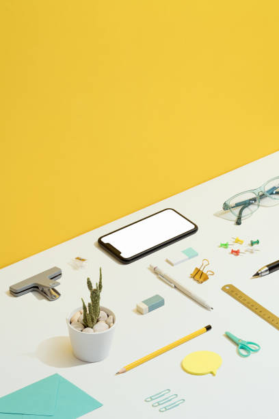 istock Stationary flat lay on yellow and white background 1269727210