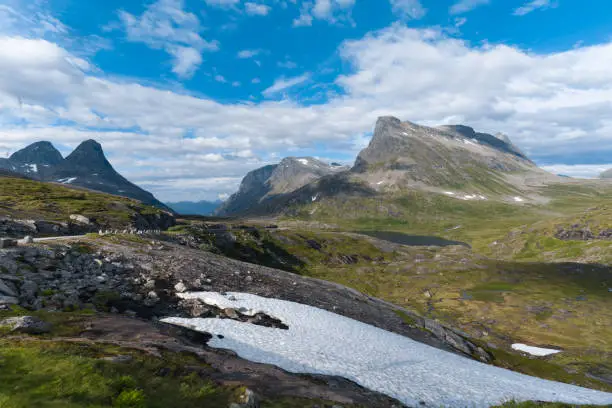 Photo of Beautiful mountain landscapes on the road approaching Trollveggen (Troll Wall) part of the mountain massif Trolltindene (Troll Peaks) in the Romsdalen valley, Norway.