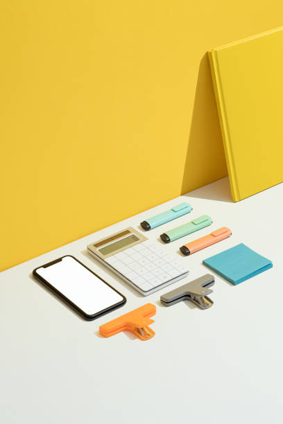 istock Office, shool supplies flat lay on yellow and white background 1269729872
