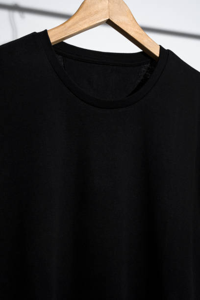 istock Black t-shirt on wooden hanger 1269732073