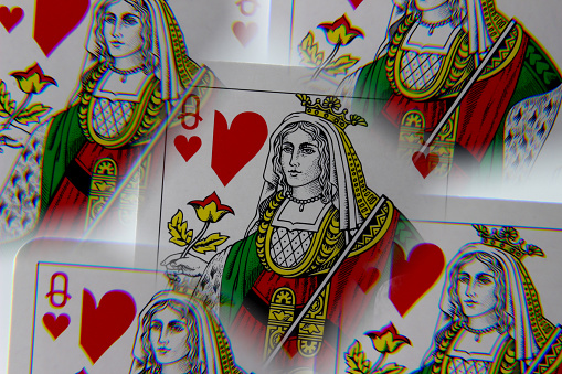 Queen of diamonds on white background.