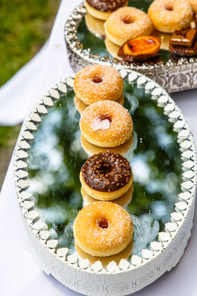 istock Donuts cakes are on a mirror dish. Furshet 1269733226