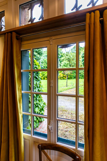 istock Stairs with Windows in an old house 1269733905