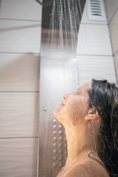 istock Young woman in a shower 1269740213