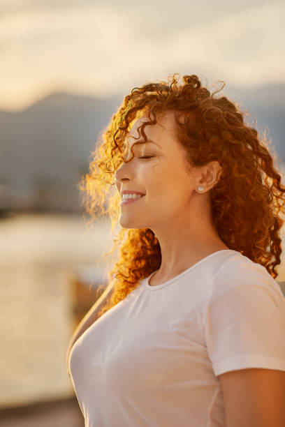 Happy young red head woman