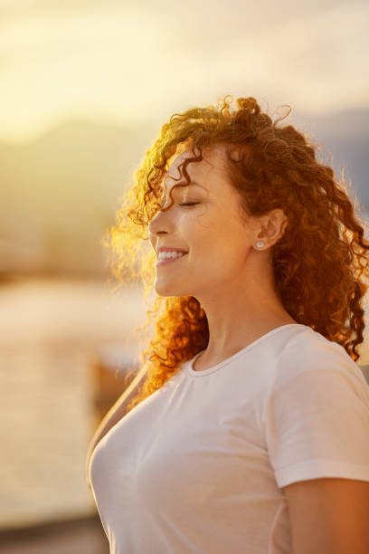 istock Happy young red head woman 1269741247