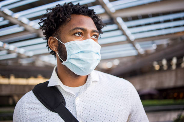 istock Black Businessman Wearing a Mask 1269745502