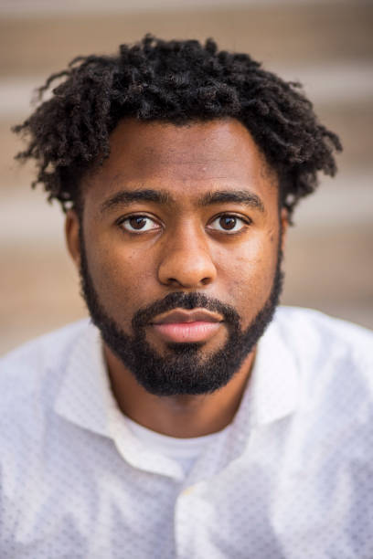 istock Closeup Portrait of a Young Black Man 1269745643