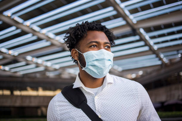istock Black Businessman Wearing a Mask 1269747154