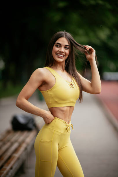 istock Beautiful woman training on running track. 1269748573