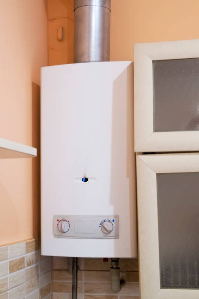 istock gas boiler water heater hanging on the wall in kitchen 1269749344