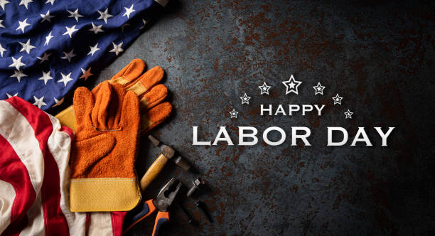 istock Happy Labor day concept. American flag with different construction tools on dark stone background, with copy space for text. 1269750985