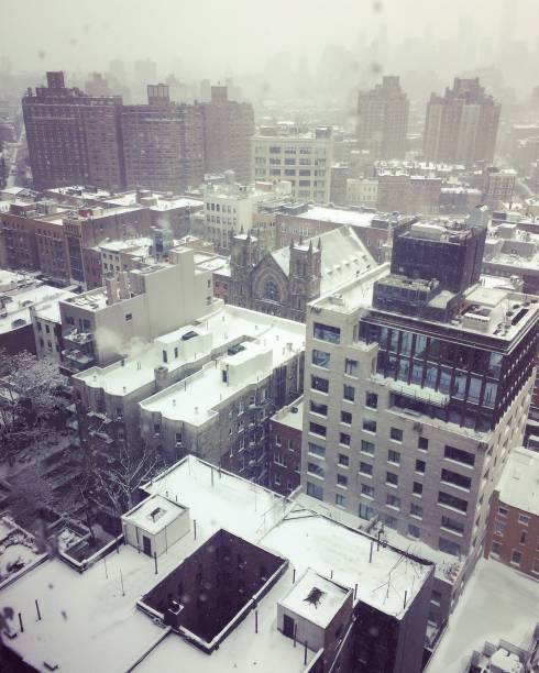 istock Corporate buildings in New York covered in snow 1269751129