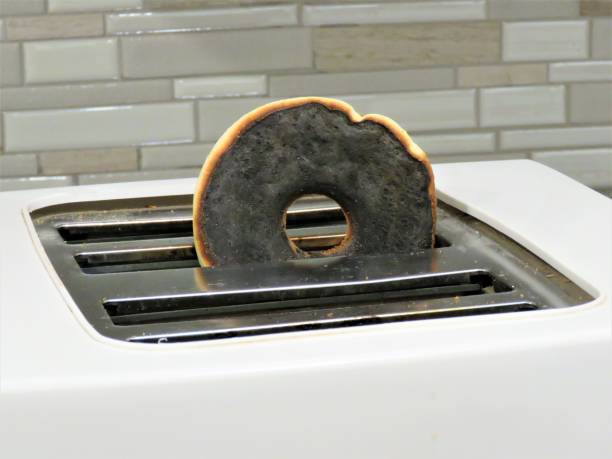 istock Bagel (beigel), burnt, in Toaster 1269751935
