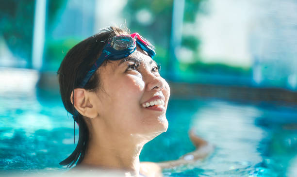 istock Swimming indoor pool with swimming goggles 1269751944