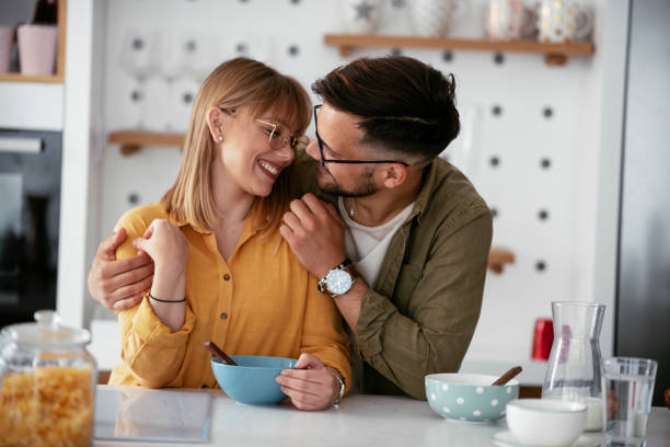 istock Loving couple eating breakfast together at home. 1269769449