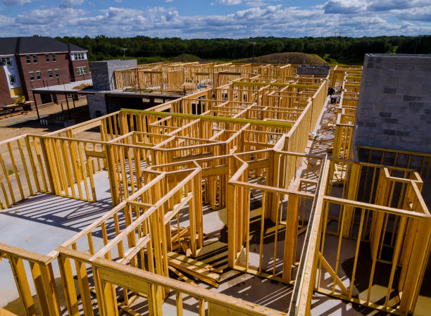 istock New construction home residential construction home framing against a blue sky 1269769683