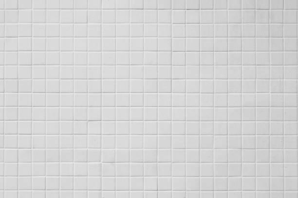istock Pattern of White tiles on the wall texture background 1269770401