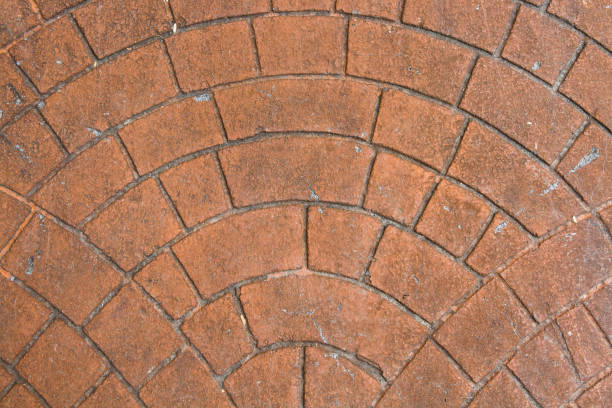 istock Close up Pattern of Vintage stone paved road blocks texture background 1269770406