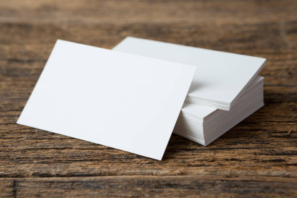 istock Stack of Business card on wood background and copy space 1269770407