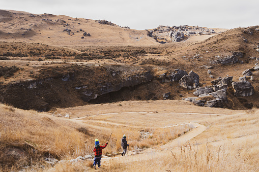 Enjoying outdoors at Castle Hill basin, a low depression bounded by the Craigieburn and Torlesse Ranges, Canterbury region of South Island, New Zealand.