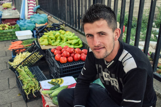 Iraq, Iraqi Kurdistan, Arbil, Erbil. Vegetable and fruit moving market on the street.