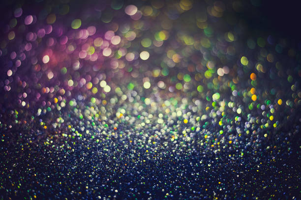 istock bokeh effect glitter colorful blurred abstract background for birthday, anniversary, wedding, new year eve or Christmas 1269781461