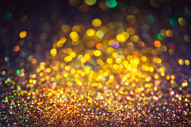 istock bokeh effect glitter colorful blurred abstract background for birthday, anniversary, wedding, new year eve or Christmas 1269781609