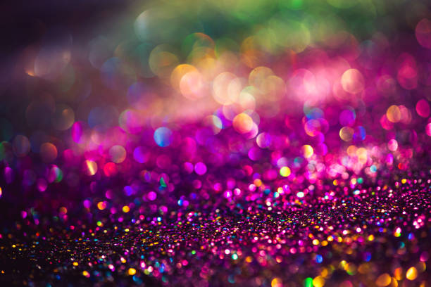 istock bokeh effect glitter colorful blurred abstract background for birthday, anniversary, wedding, new year eve or Christmas 1269782190